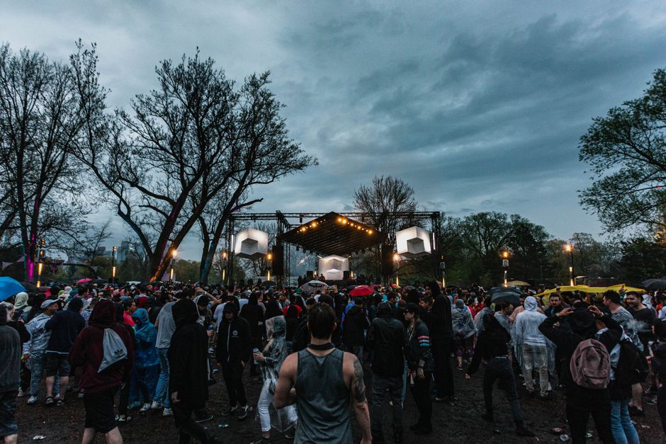 A concert crowd at sunset
